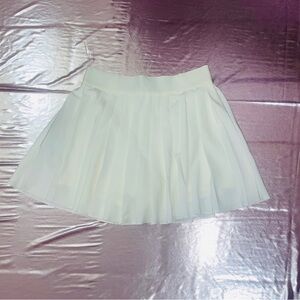 White pleaded skirt